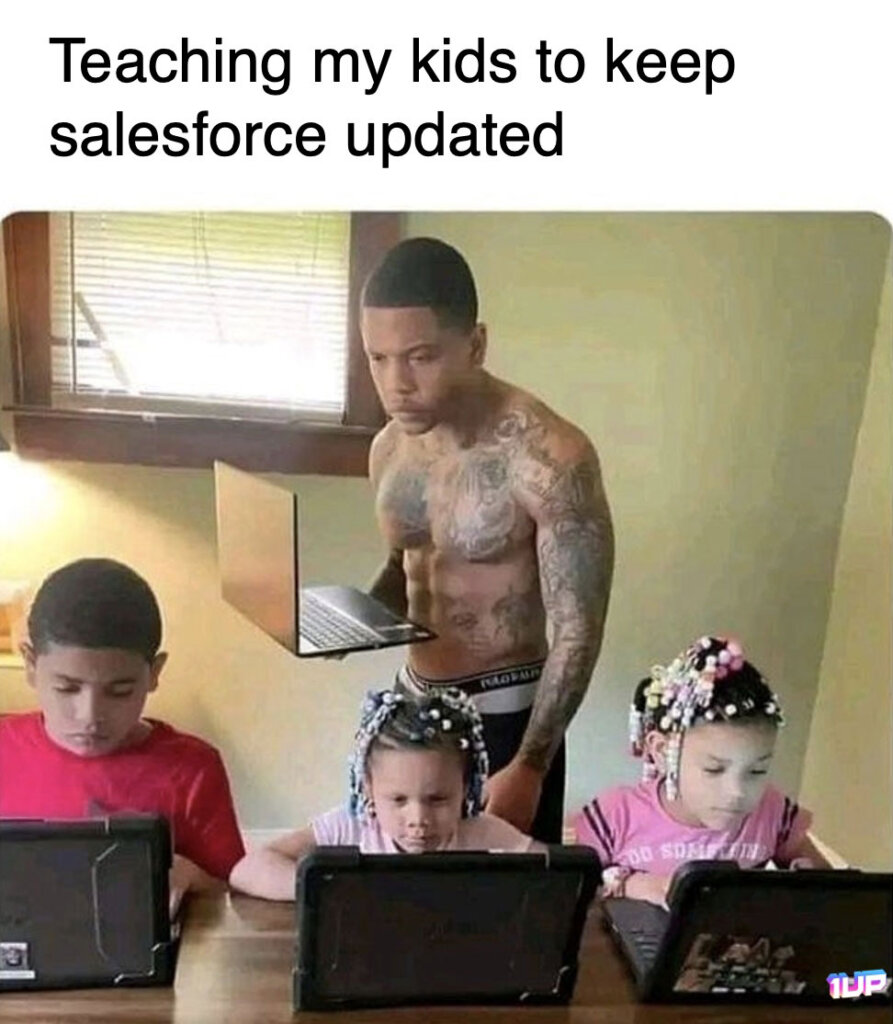 A man looking over his kids computers